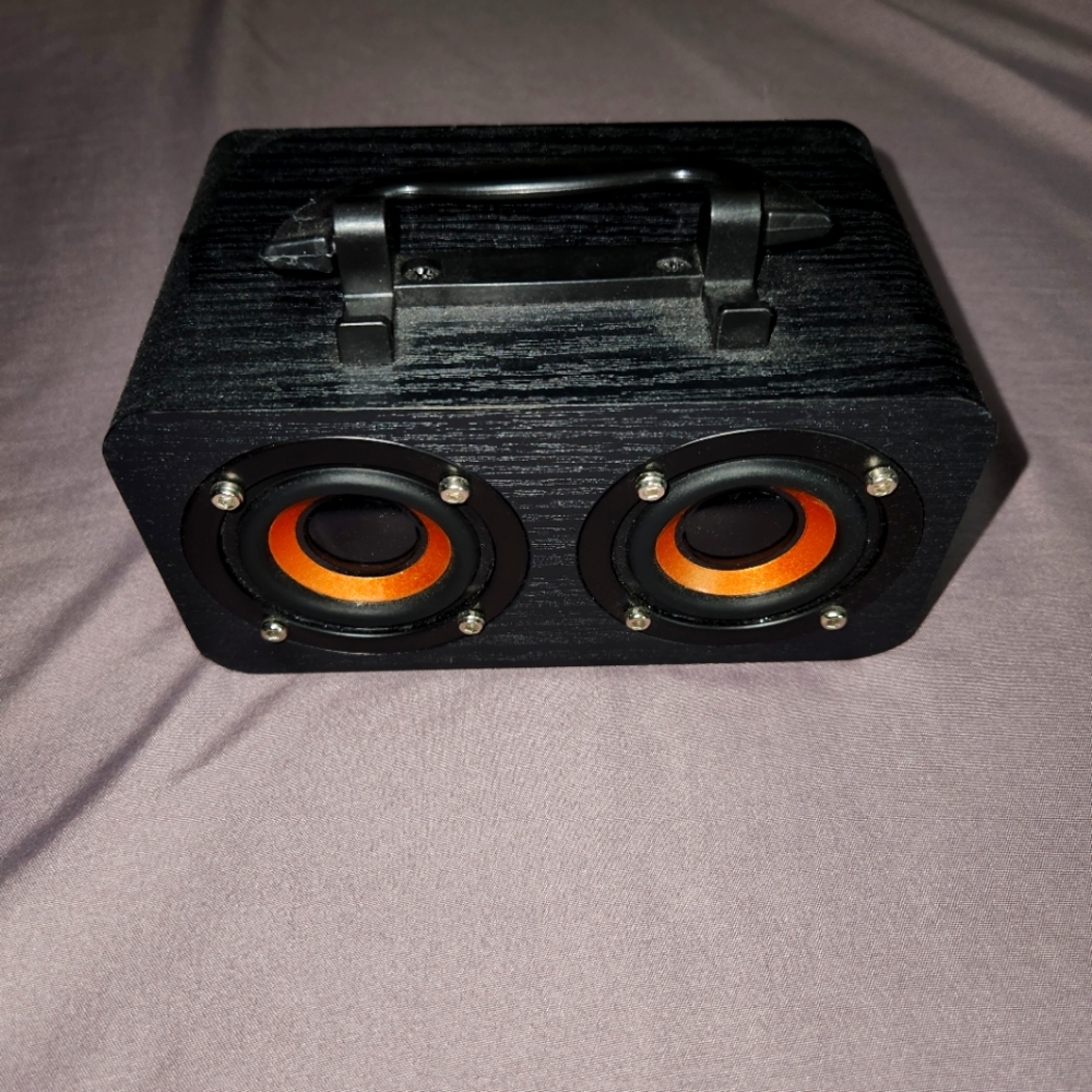 Portable Black Speaker with Orange Accents
